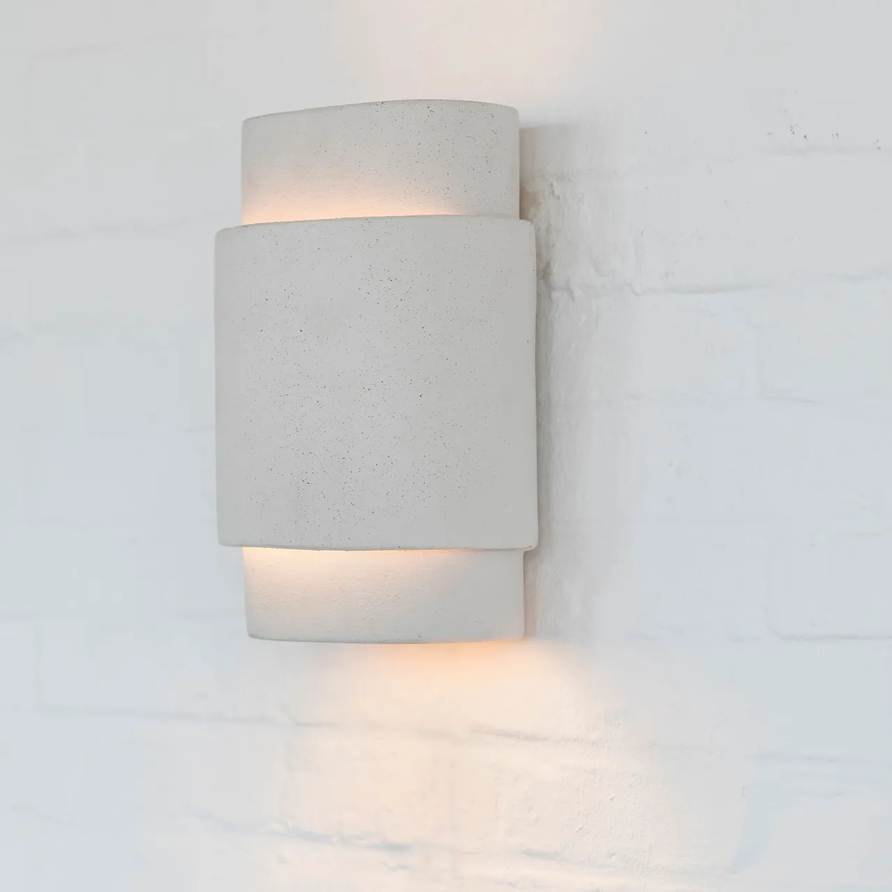Vägglampa beige pierre